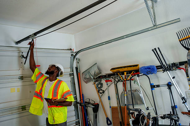 Professional Garage Door Panel Replacement technician working in Jasper County County, IN